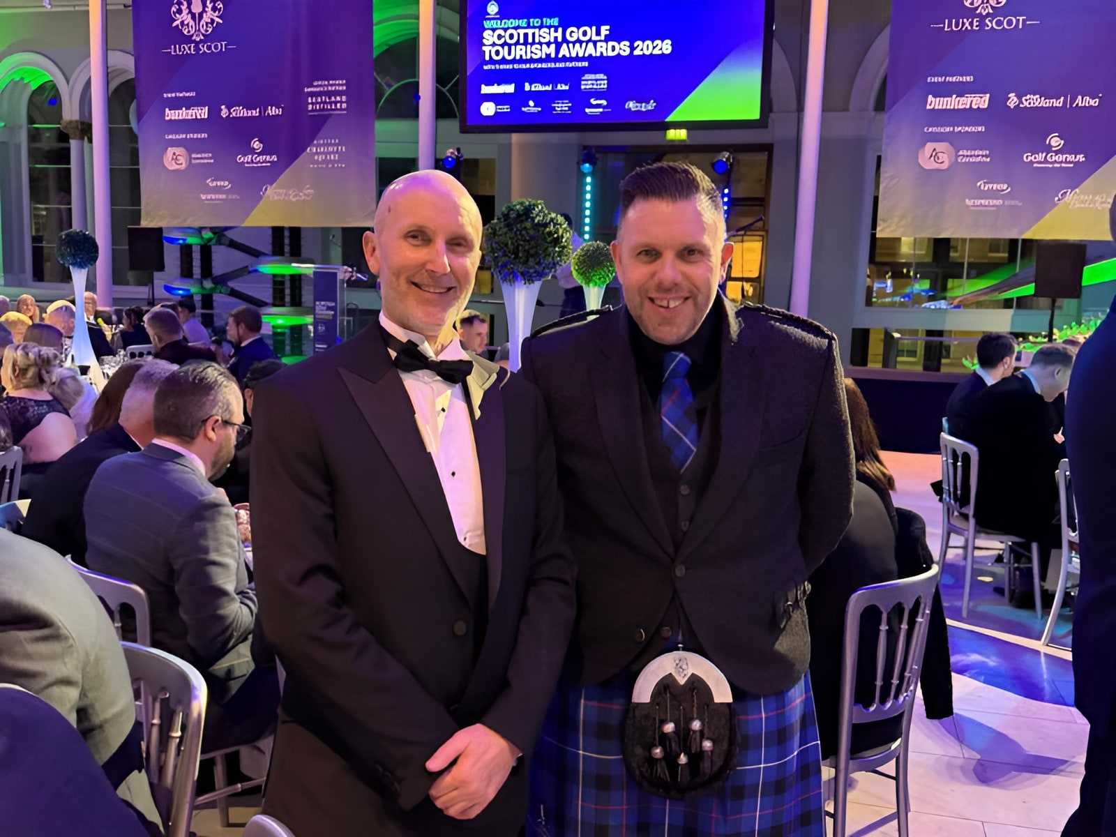Two men in formal attire, one wearing a kilt, at the Scottish Golf Tourism Awards 2026 gala event.