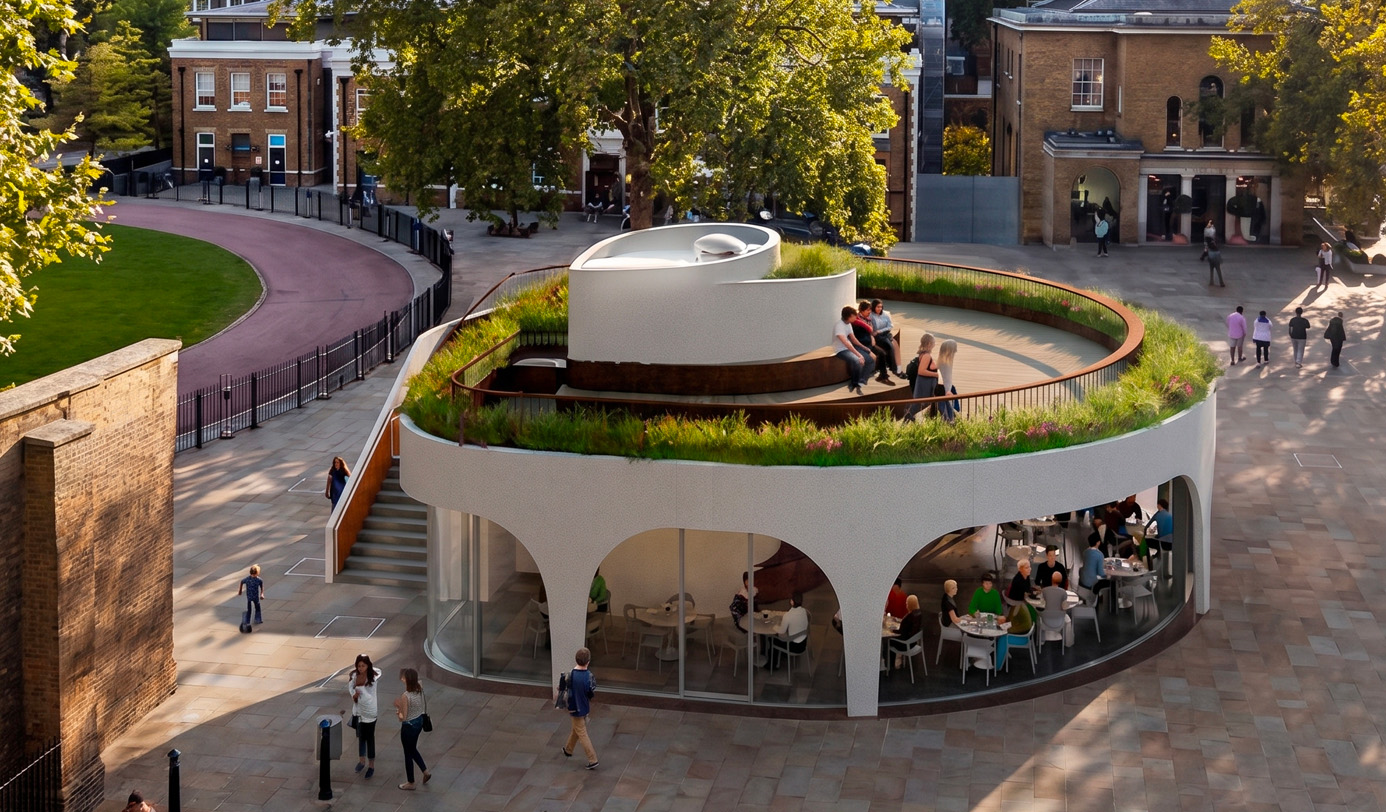 Aerial CGI rendering of a circular public building with an accessible green roof planted with grasses and wildflowers, a Corten steel edging detail, and a glazed ground-floor cafe beneath.